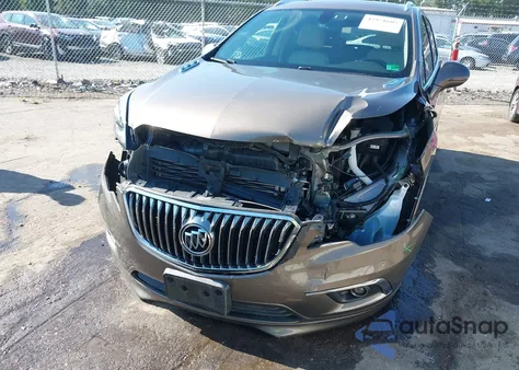 2018 Buick Envision Essence z USA, uszkodzony, nr VIN LRBFX1SA3JD027381